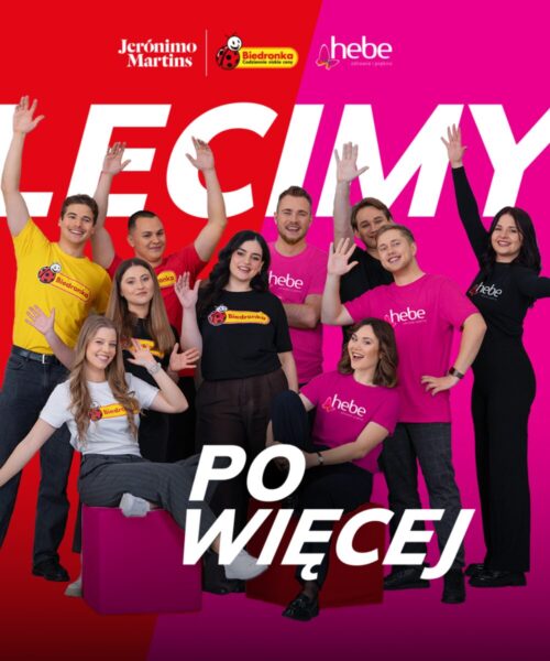 Smiling people waving at the camera. The caption reads: We're coming for more.